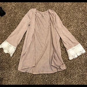 Mid length cream cardigan with crochet detail